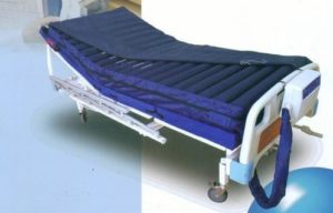 Matelas anti-escarres avec compresseur