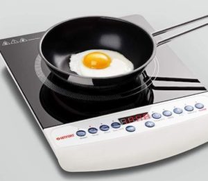 Quel type d'ustensile de cuisine peut-on utiliser pour une cuisinière électrique ?