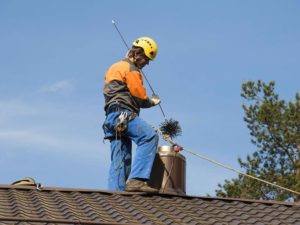 Ramonage mécanique de cheminée.