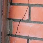 Comment couvrir les fissures du poêle entre les briques.