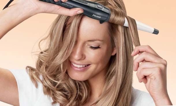 Comment utiliser un fer à friser conique