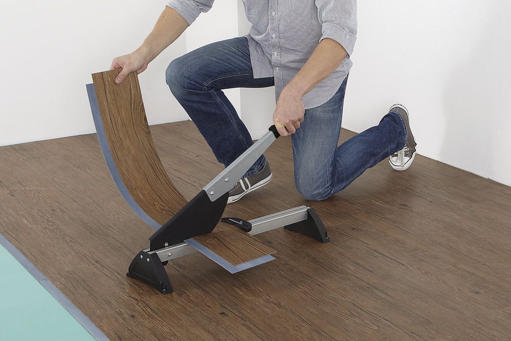 Comment couper un sol stratifié avec une guillotine.