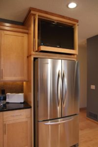 Est-il possible de mettre une télévision sur un réfrigérateur ?