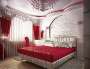 Caractéristiques du design de la chambre dans les tons rouges
