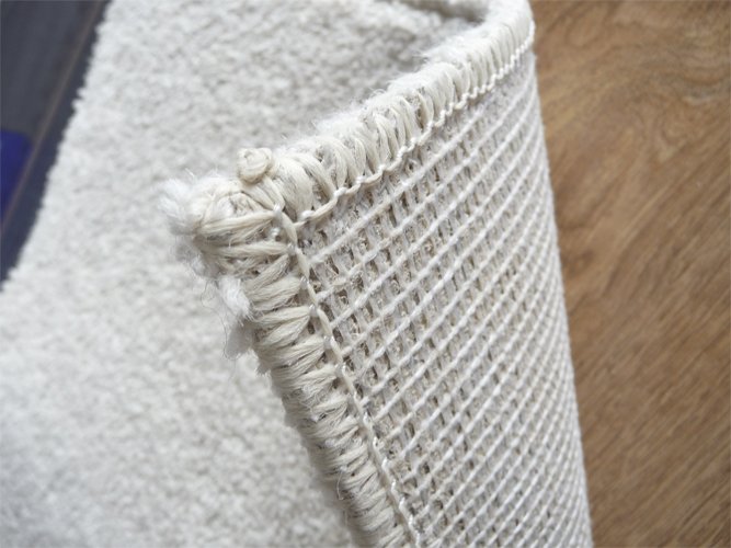 support de tapis en jute