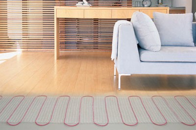 Pose de planchers chauffants sous stratifié