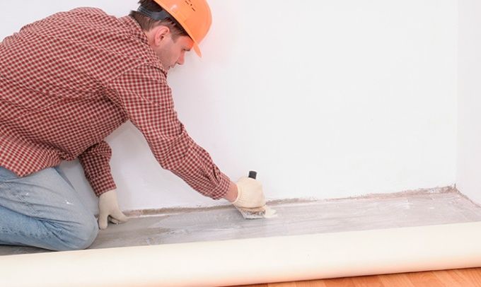 coller du linoléum sur du béton