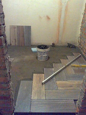 Pose de carrelage en chevrons