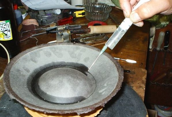 Scellement de l'enceinte sur la colonne