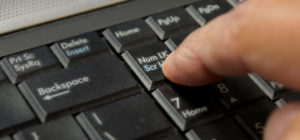 Comment le bouton Num Lock est-il apparu ?