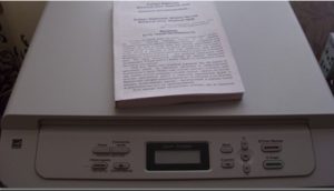 Imprimer un livre sur une imprimante.