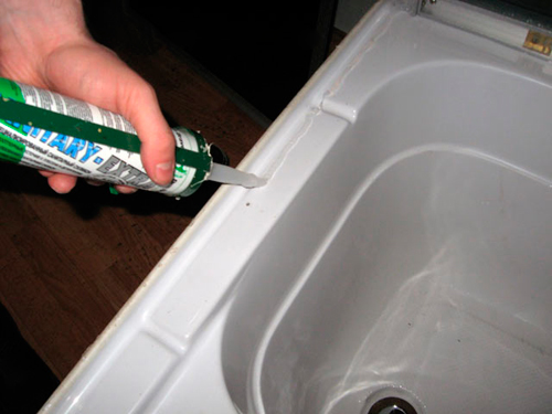 Étanchéité des joints de cabine de douche.