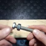 Écrou sans clé - majuscule