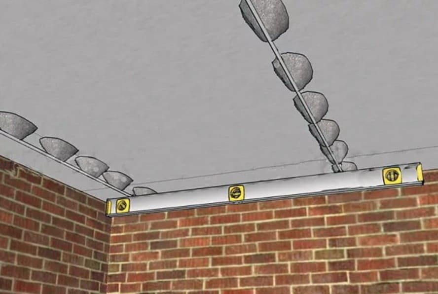 Balises en plâtre au plafond.