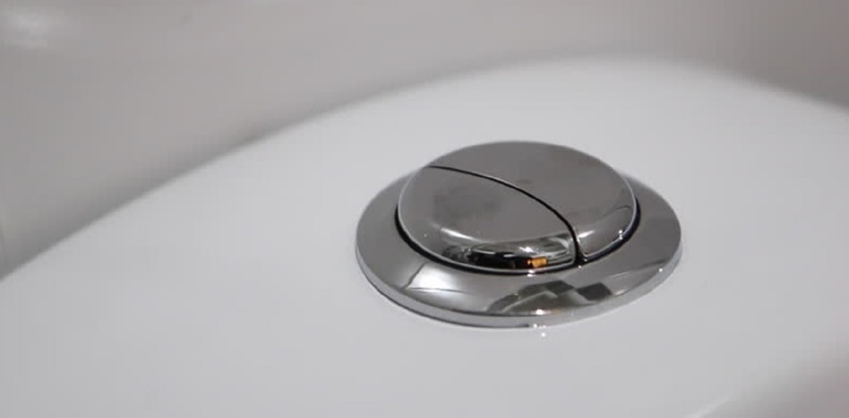 Bouton sur le réservoir