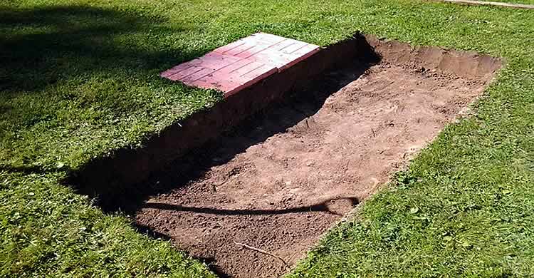 Préparer les fondations d'un barbecue.