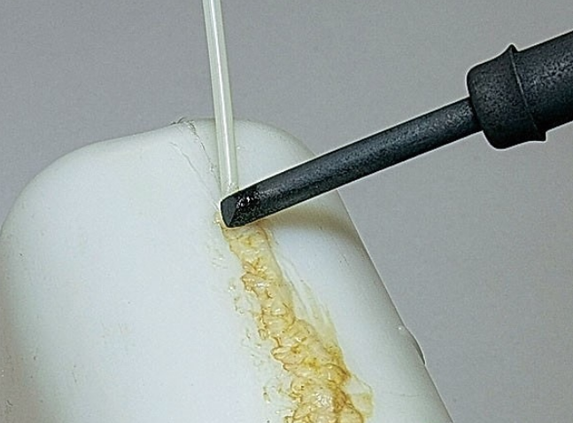 Réparer avec un fer à souder.