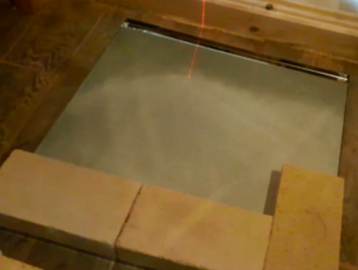 Poêle dans un bain public sur parquet 5