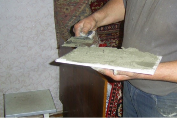 Poser du carrelage sur le poêle